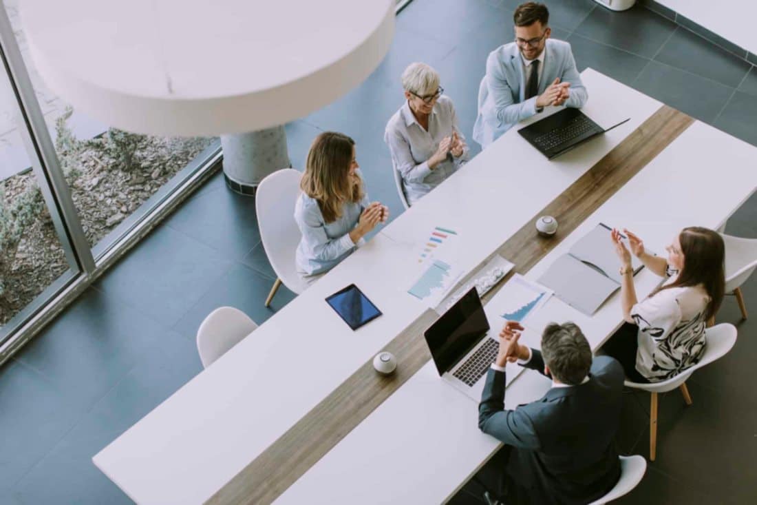 Group of people attending office meeting in North America 