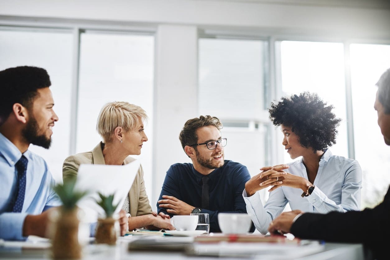 A group of people discussing something important