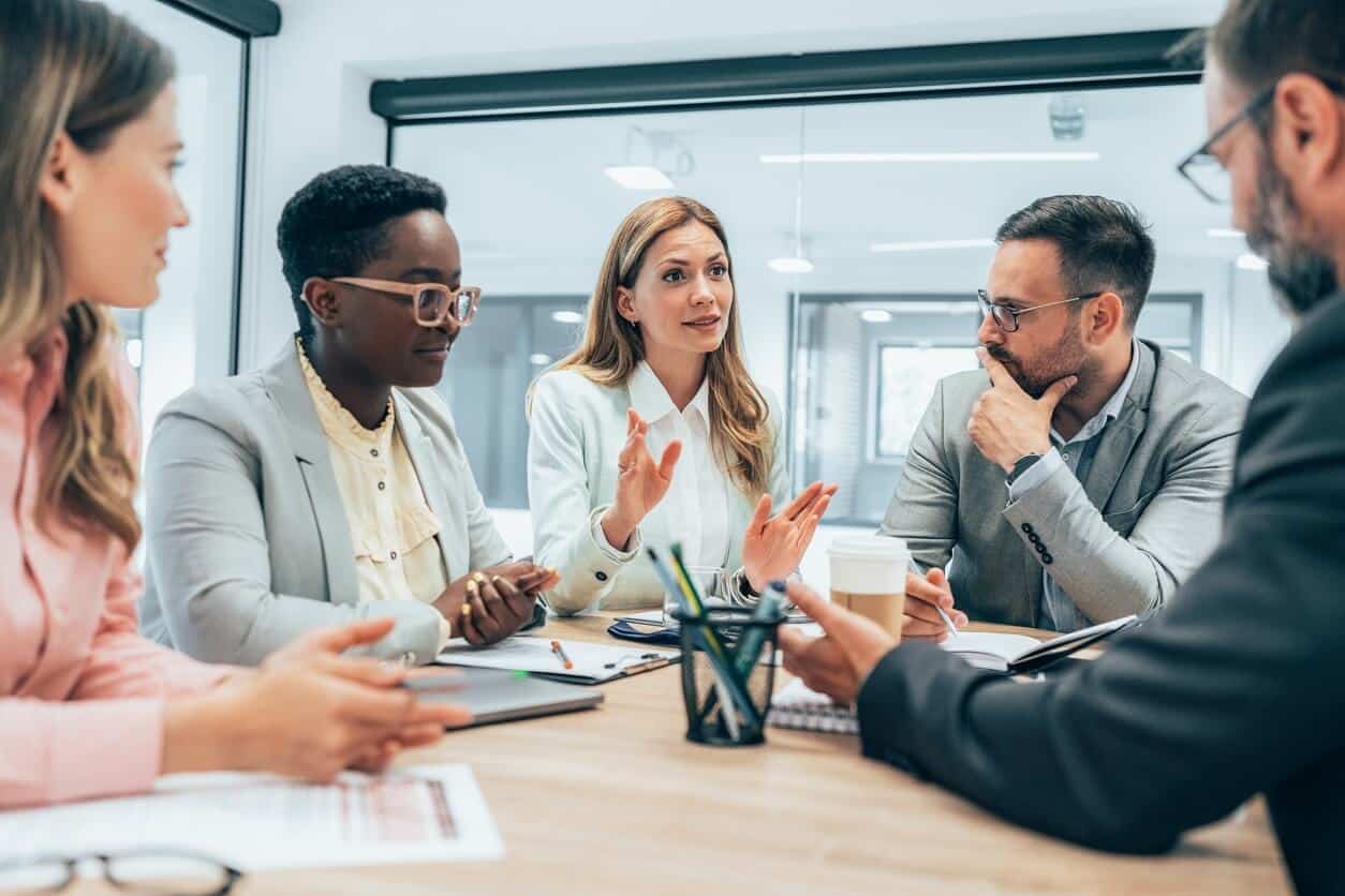 Business team members participating in a meeting